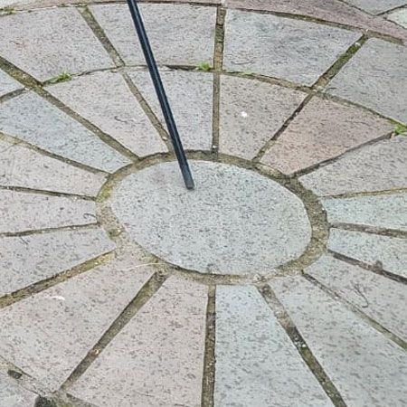 Circular paved patio feature